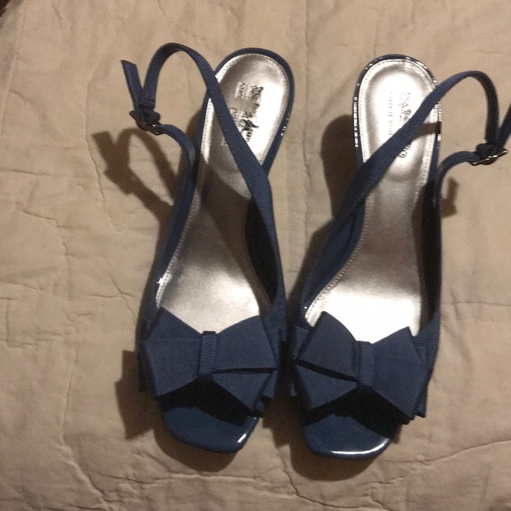 Royal blue shoe made by coach and four
